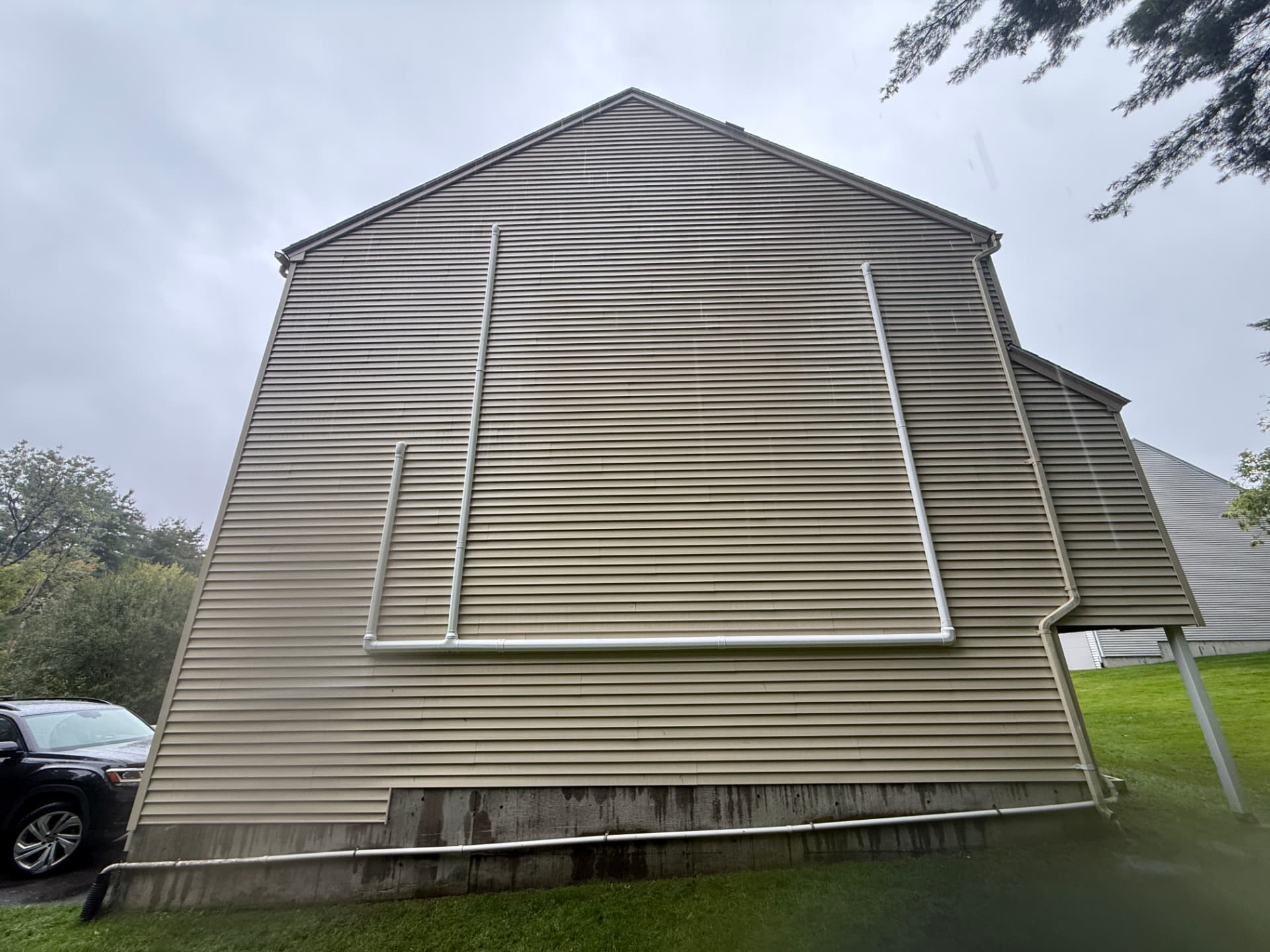 Clean exterior line-hide runs along the side of a house